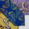 Close up detail of 3 different paisley ties