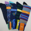 5 pairs of blue based socks fanned out